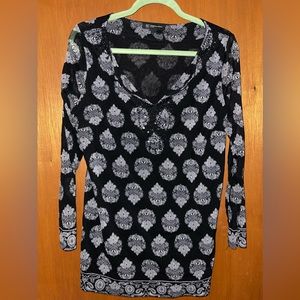 Black v neck blouse with white design
